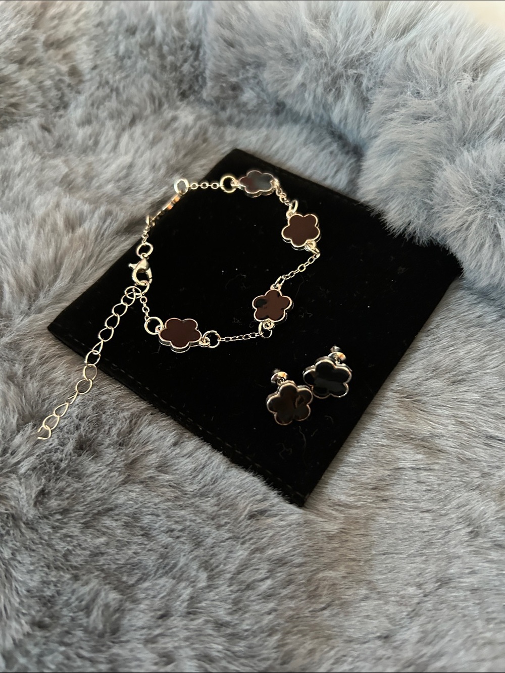 Silver Clover Link Bracelet with Black Enamel Accents & studs Earrings.